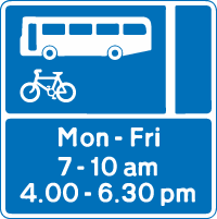 A bus lane sign with times showing